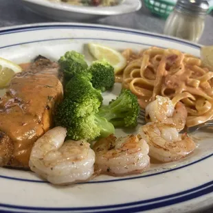 Salmon special with shrimp fettuccine and broccoli