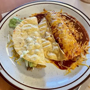 Beef taco and chicken enchilada with red sauce