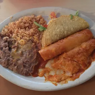 Two cheese enchiladas, a beef taco, with rice and beans