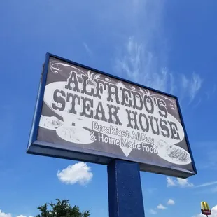 a sign for a restaurant