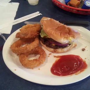 Cheeseburger and onion rings for breakfast.  Prices are better than fast food joints. Very popular local place