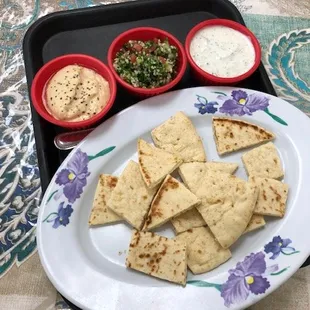 Tabouli hummis and cucumber Yogurt with pita