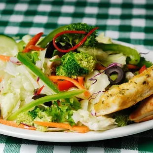 a salad with chicken and vegetables