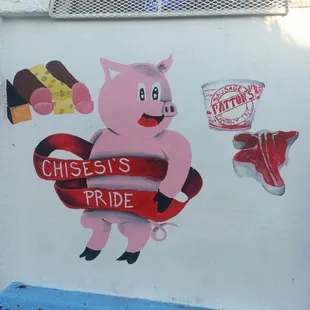 a pig with cheeses pride
