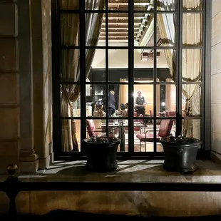 a view of a restaurant through a window