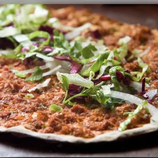 a close up of a pizza
