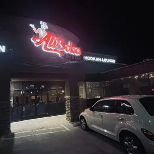 a car parked in front of the restaurant