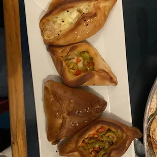 Cheese, olive and spinach pies