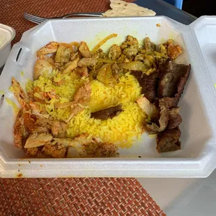 a meal in a styrofoam container
