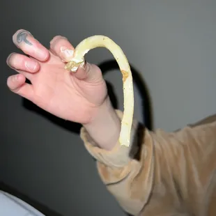 a person holding a banana