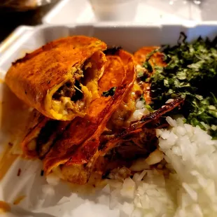 Quesabirrias with Cilantro and Onions on the side only cuz I don't like raw onions. But these quesadillas are pretty tasty!