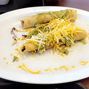 5 Pieces Rolled Tacos taste good with the Molcajete type of sauce.