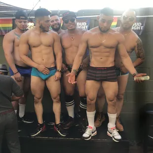 a group of men in underwear