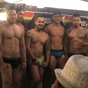 a group of men in underwear