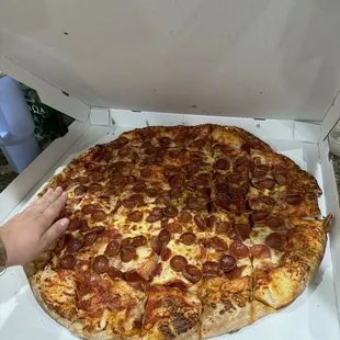 The extra giant pizza.