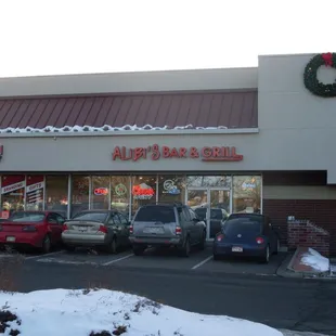cars parked in front of the restaurant