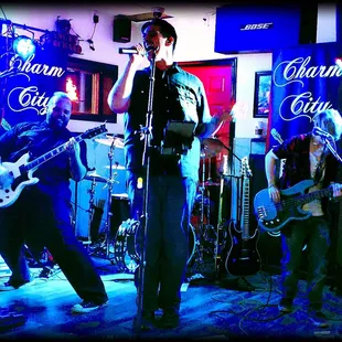 a band performing on stage