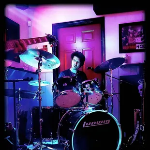 a man playing drums