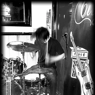 a man playing drums