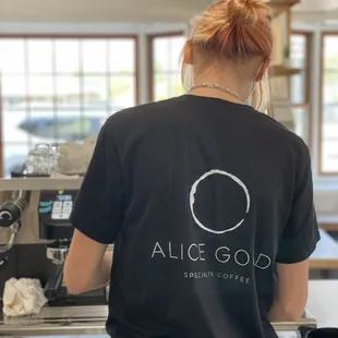 a woman in a black t - shirt