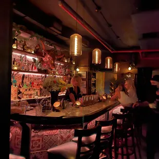 people sitting at the bar