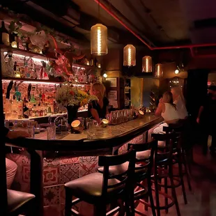 people sitting at the bar
