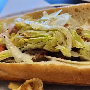 Smokey Pig Supreme sandwich (smoked pulled pork + crispy bacon + vegetation) about to magically disappear.