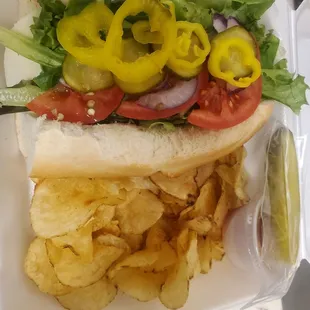 Veggie sub (reg size). Organic spring mix and load it up! It comes with talian, ranch or Olive oil and Red wine vin as well.  Veggie Sub