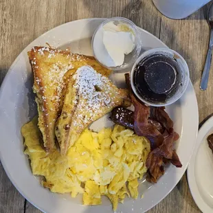 Breakfast sampler with French Toast, bacon and sausage link.