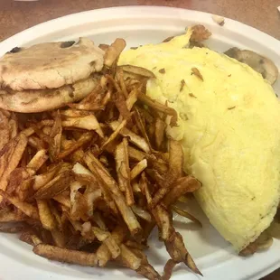 Scotty Omelette, with fresh grated hash browns and an English muffin. One of the best omelettes I've ever had!