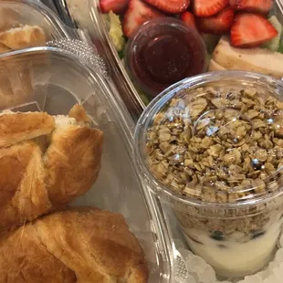 Salads, sandwiches, and yogurt with granola and fresh fruit