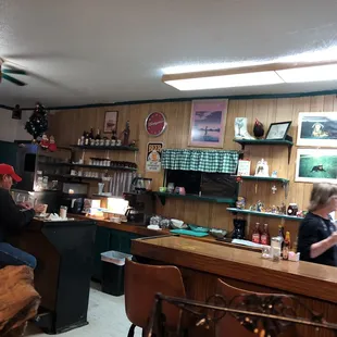 people sitting at the bar