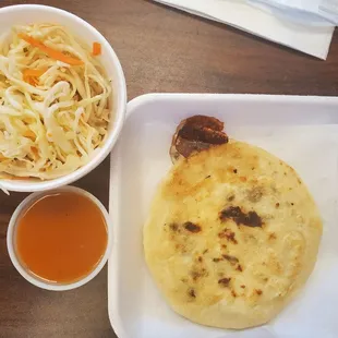 Cheese and loroco pupusa