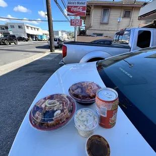 Spicy shoyu Spicy Ahi Poke with Roast Pork and Ponzu Salmon with Char Siu. Macaroni Potato Salad White Pepper Oyster Sauce and a drink.