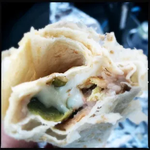 The inside cheesy goodness of a Chile Relleno burrito