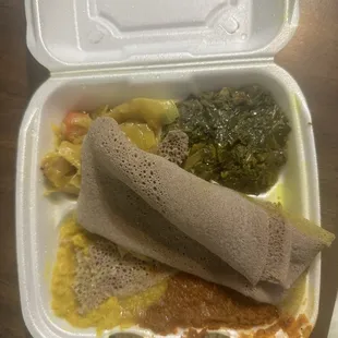 Injera with medley of other food