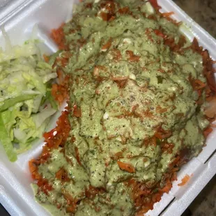 a meal in a styrofoam container