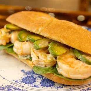Shrimp sandwich with avocado and spinach, some spicy mayo and really delicious ciabata bread