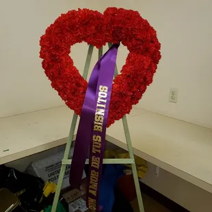 Open red carnation heart