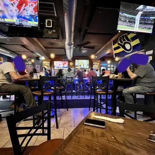 people sitting at the bar