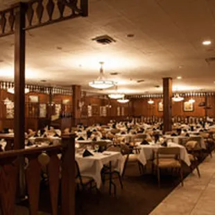 a dining room with tables and chairs
