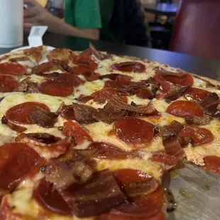 Pepperoni and bacon pizza