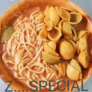 a bowl of pasta and clams
