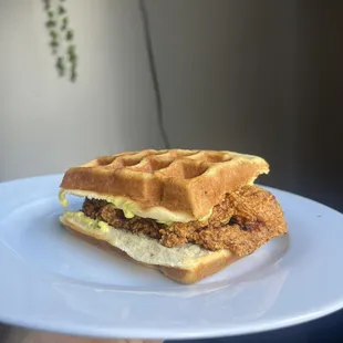 A delicious chicken waffle sandwich be ready it&apos;s spicy