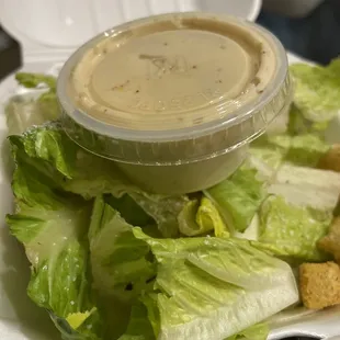 $4.45 Caesar individual salad - dressing is good