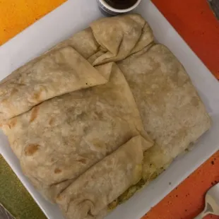 Shrimp roti with tamarind sauce on the side