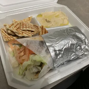 Gyro with cheese and all the fixings! The hummus is the BEST I've ever tasted!