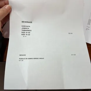 a person holding a piece of paper