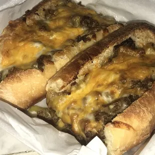 Philly Cheese. Pepper rings and grilled onions. A lot of really juicy beef!
