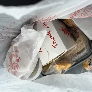 a sandwich in a plastic bag